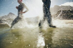 Athletes training for triathlon race.