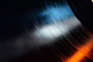 Close-up shot of 12-inch LP vinyl record groove.